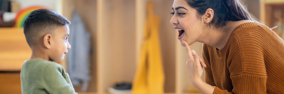 Supporting Language therapy thru Play. Kid on speech therapy.